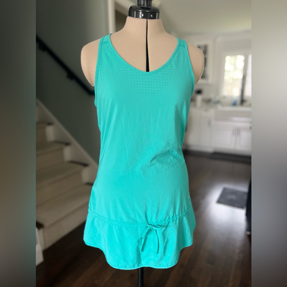 Light weight Air Dry Racer back dress w/ a zip pocket, and a draw string tie.